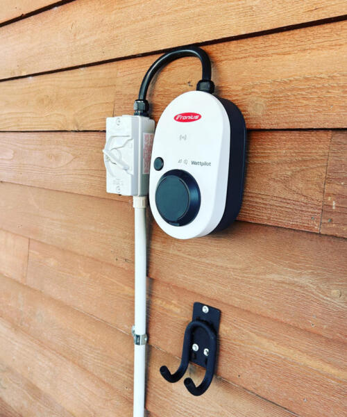 EV charger installed on side of weatherboard home in Geelong