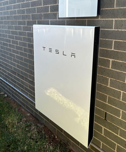 Tesla Powerwall solar battery installed on side of Geelong home